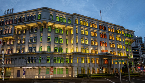 Canvas Print Singapore, July 24, 2022 - Police station is lit in multiple colors at night