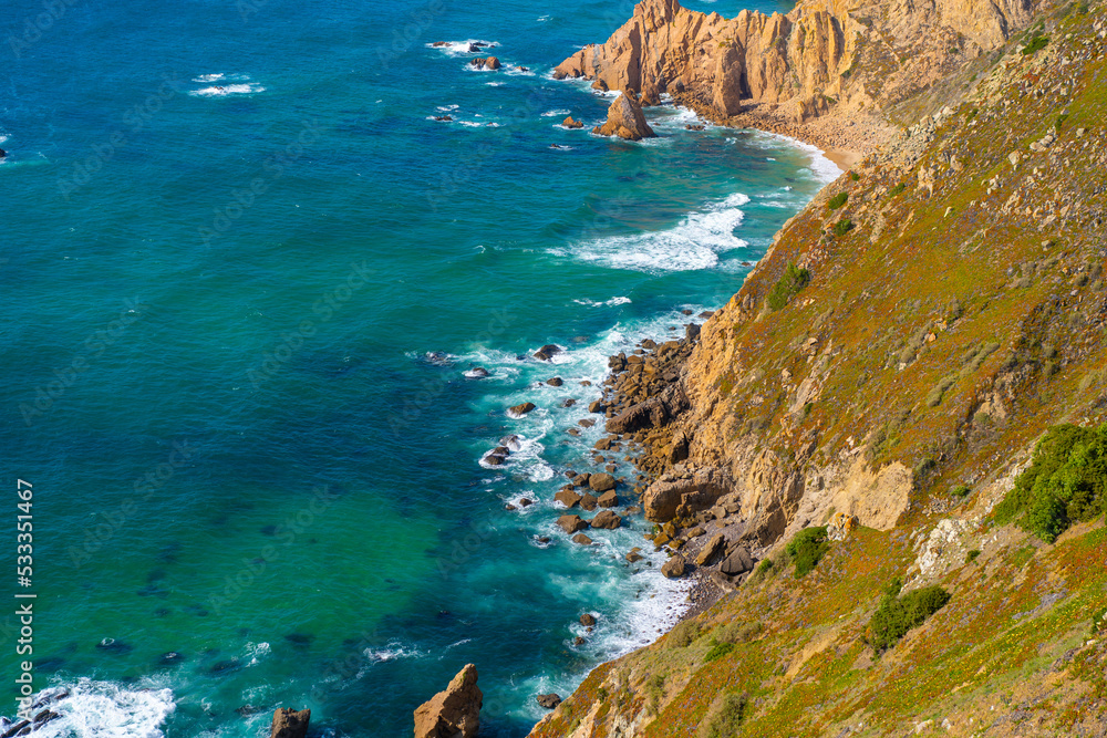 Atlantic ocean view with cliff. View of Atlantic Coast at Portugal, Cabo da Roca. Summer day