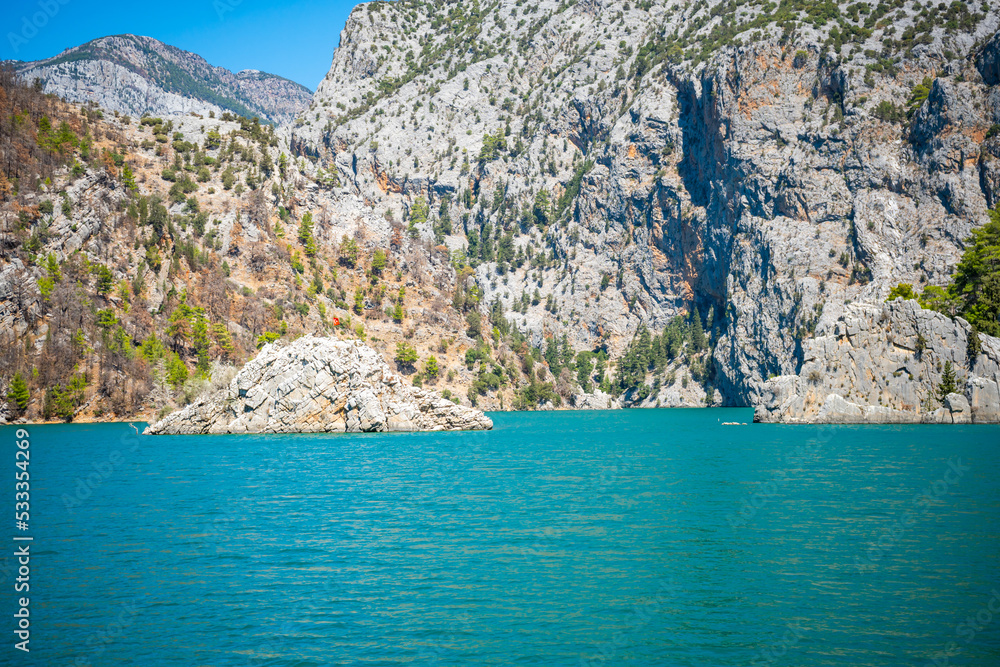 Mountain Lake. Emerald water reservoir behind the dam Oymapinar. Green Canyon in Manavgat region, Turkey. Mountain Lake. Emerald water reservoir behind the dam Oymapinar. Green Canyon in Manavgat region, Turkey.