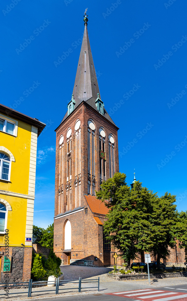 Fototapeta premium XV century St. John the Baptist gothic church in historic old town quarter of Stargard in Poland