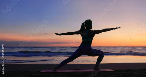 Fototapeta Naklejka Na Ścianę i Meble -  woman practice yoga on beach