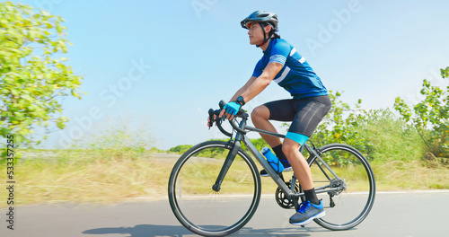 man ride a bike photo