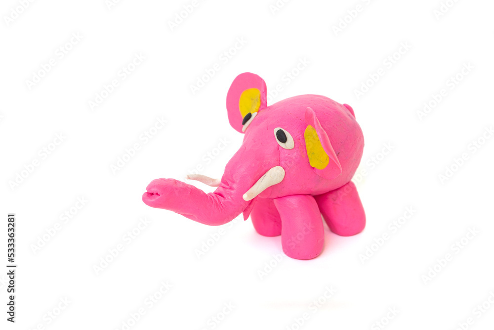 Cute elephant plasticine sculpture, pink body on white background. Handmade clay plasticine