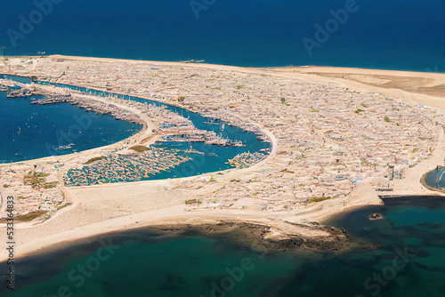Arrecife Canary Islands June 29 2022 View of the residential complex and the city beach of Reducto at low tide in the capital of the island of Lanzarote Arrecife , style U1 1 photo
