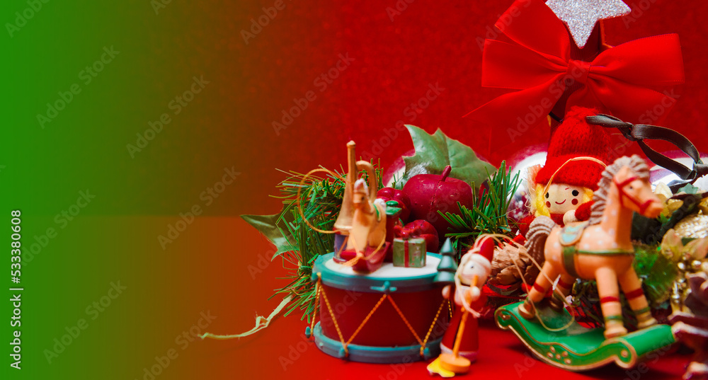 christmas banner or christmas postcard with toys and christmas figures on a red background. merry christmas.