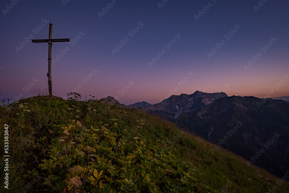 Stunning sunset hike from the top in the austria mountain