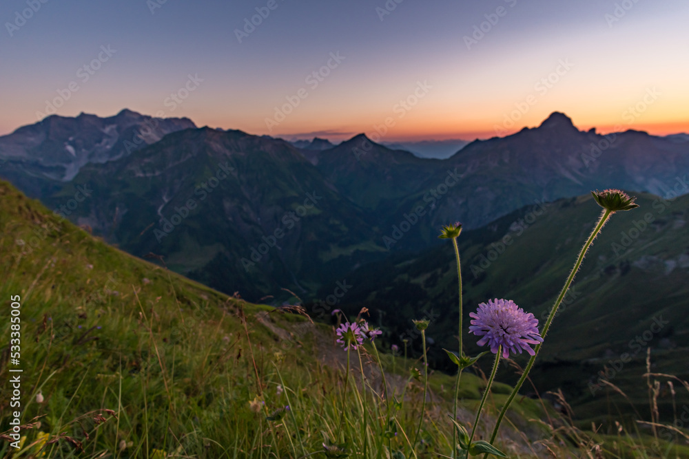 Stunning sunset hike from the top in the austria mountain