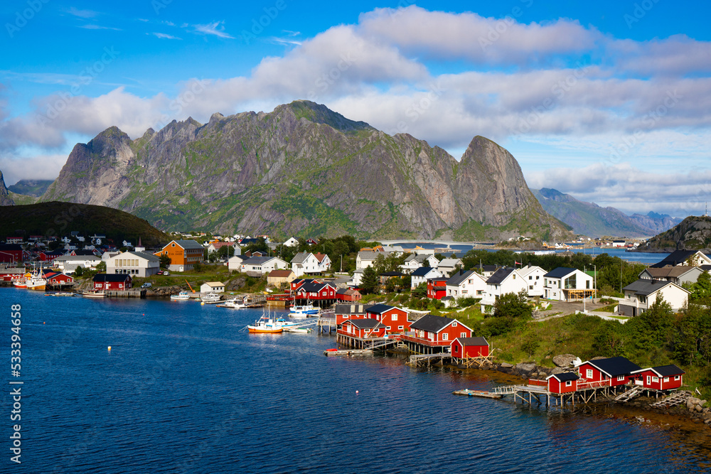 Typical charming Norwegian villages situated over mountain ranges