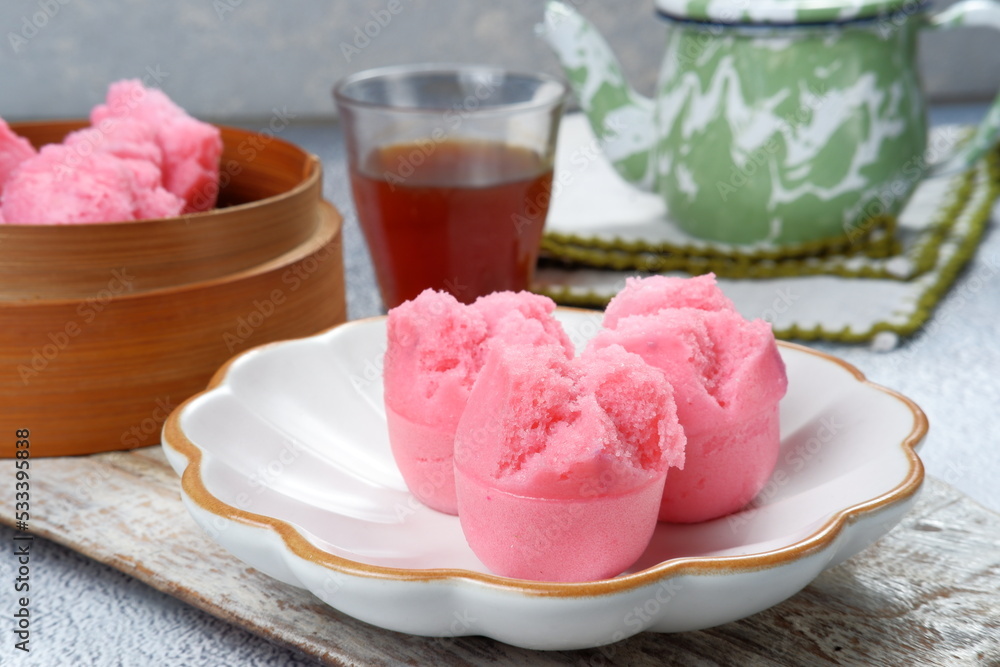 Kue mangkok or kue apem.steamed cupcakes or Fa Gao are special cakes during Chinese New Year celebrations.
Fa Gao is believed to be a fortune cake. Kue mangkok or kue apem.steamed cupcakes or Fa Gao are special cakes during Chinese New Year celebrations.
Fa Gao is believed to be a fortune cake.