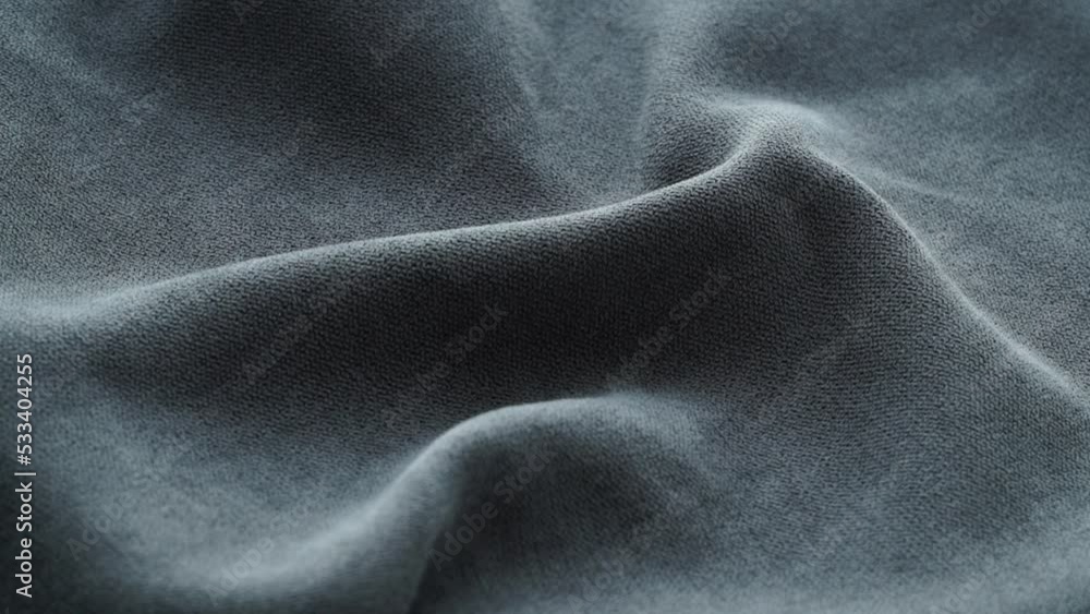 Close up of upholstery grey fabric for furniture rotate in circle. Textile, material, cloth. Furnishing fabrics industry concept. Close up of upholstery grey fabric for furniture rotate in circle. Textile, material, cloth. Furnishing fabrics industry concept.