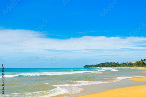 Tropical summer beach with sun. Vacation and travel concept.