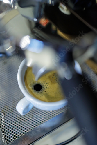 making espresso coffee with a professional espresso machine