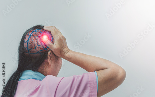 Close up older woman suffering from head pain, stroke concept, ischemic stroke, health problem and people concept.