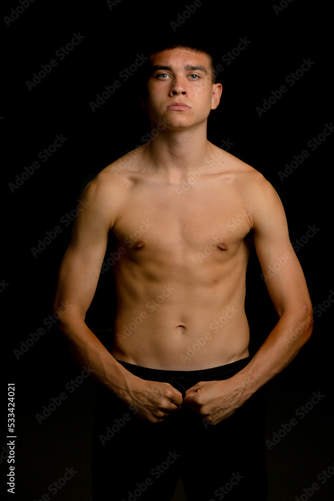 Nineteen year old teen boy shirtless portrait