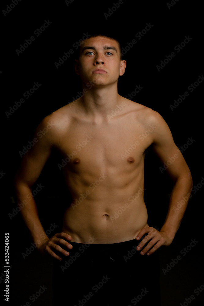 Nineteen year old teen boy shirtless portrait