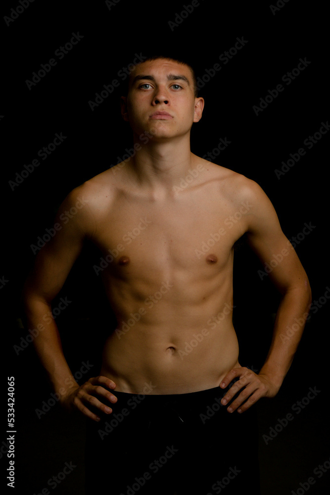 Fototapeta premium Nineteen year old teen boy shirtless portrait