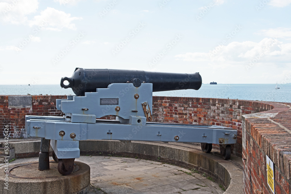 Vintage canons line the walls of Southsea Castle near Portsmouth in the United Kingdom.
