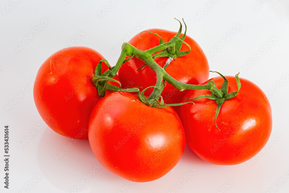 Close up shot of red tomato with water drops Close up shot of red tomato with water drops