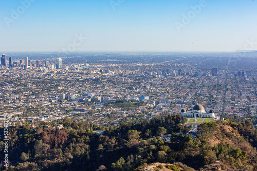 Sunny view of the Los Angeles cityscape with Griffith Observatory