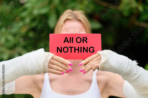 The text written on the ALL OR NOTHING card means that you are doing something either completely or not at all