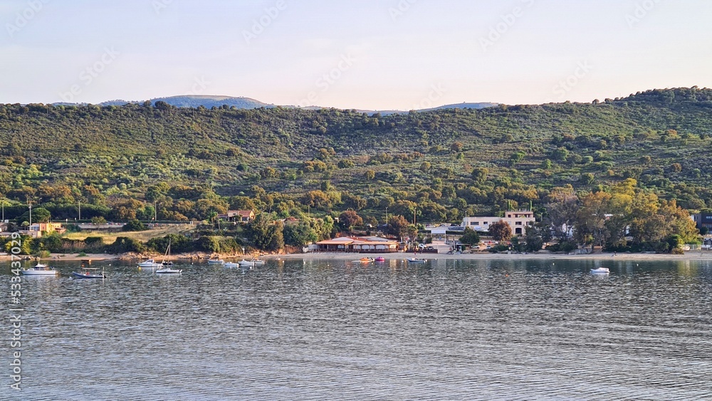 Naklejka premium Panorama from sea to the coast of the French island of Corsica in the summer of 2022