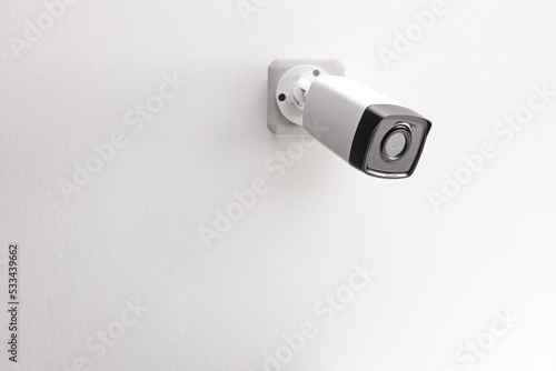 Security camera mounted on a wall