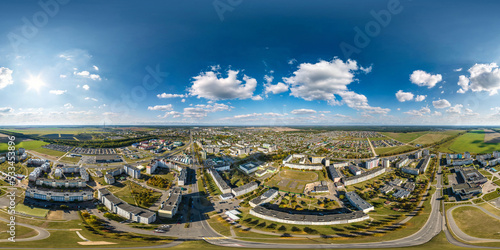 aerial full seamless spherical 360 hdri panorama view above great height of small provincial town with private sector and high-rise apartment buildings in equirectangular projection.