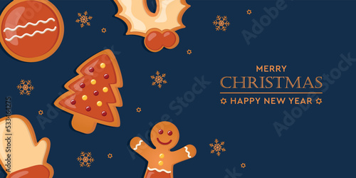 christmas greeting card with gingerbread cookies decoration on blue background