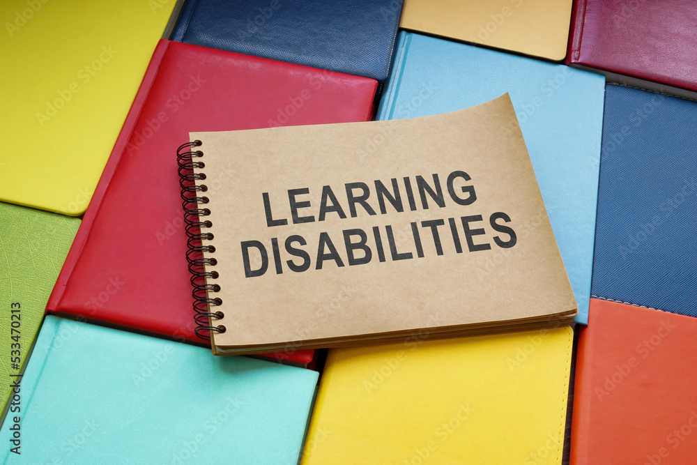 learning-disabilities-sign-in-the-notepad-and-books-stock-photo