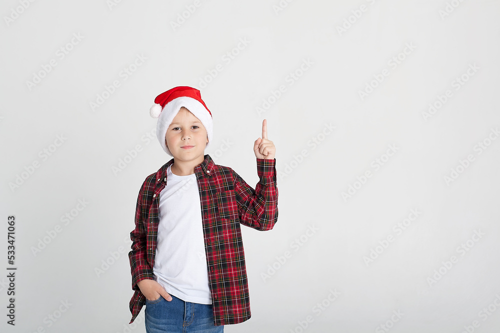 Cute little boy in the santa claus hat. Cute little boy in the santa claus hat.