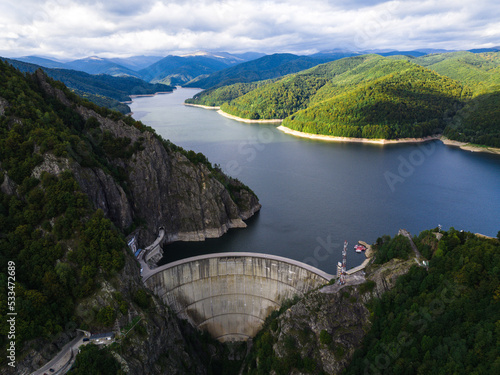 Fototapeta Naklejka Na Ścianę i Meble -  Aerial view of the Vidraru Reservoir in the Fagaras Mountains in Romania