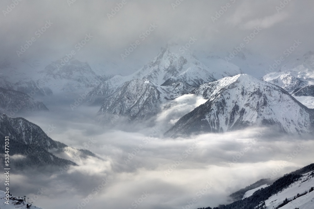 Mountain winter landscape above clouds Mountain winter landscape above clouds