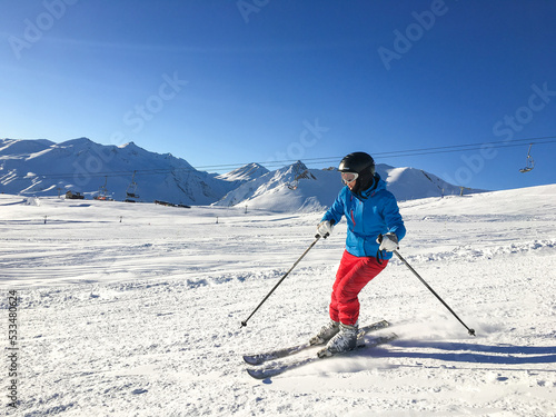 Woman skiing in the mountains