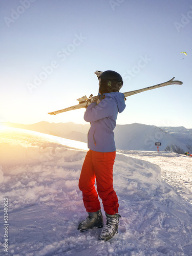 Woman skiing in the mountains photo