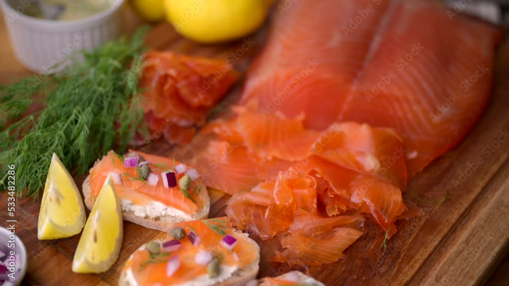 sliced cured salmon on bread with cream cheese sliced cured salmon on bread with cream cheese