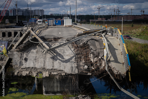 «Irpin, Kyiv region, Ukraine - september 25. 2022:A bridge destroyed by the Ukrainian Armed Forces near the town of Irpen to stop the passage of troops of the enemy Russian army.».