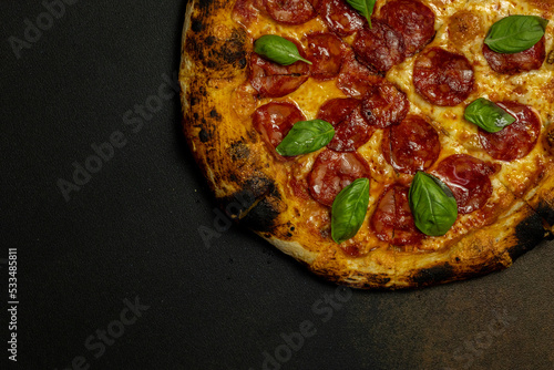 Pizza background pizza on black background photo