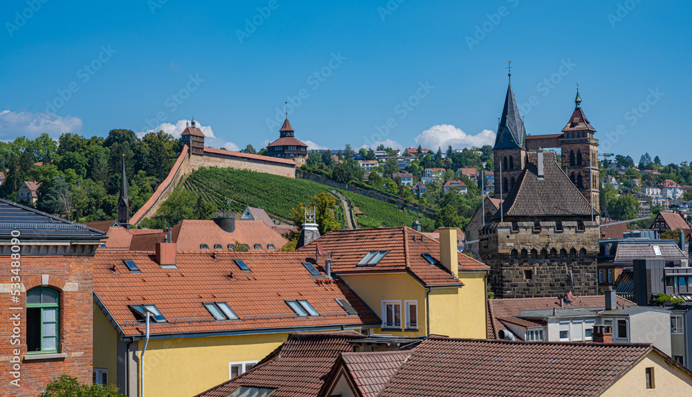 View of the historic city walls, St. Dionysius church (Stadtkirche St. Dionys) and castle Guardhouse (Hochwacht) and Thick Tower (Dicker Turm) in Esslingen am Neckar.Baden-Württemberg, Germany Europe