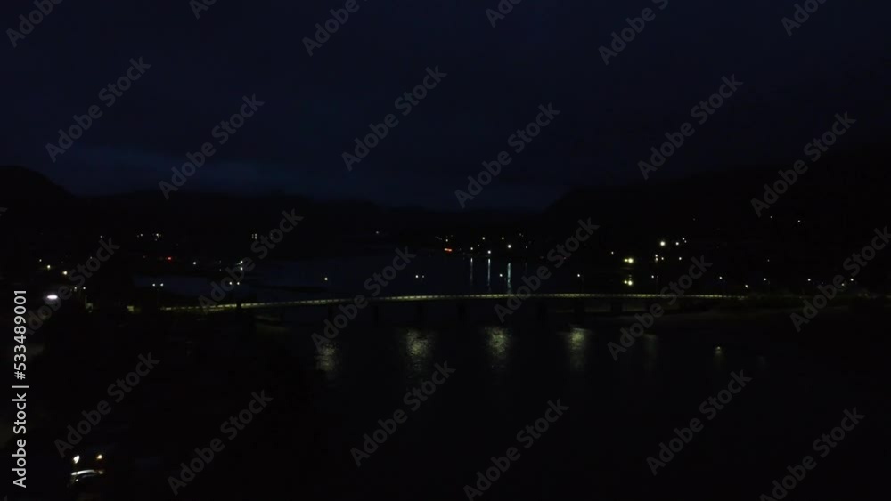 Picturesque view of the night bridge over the river Picturesque view of the night bridge over the river