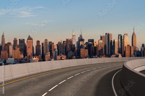 Empty urban asphalt road exterior with city buildings background. New modern highway concrete construction. Concept of way to success. Transportation logistic industry fast delivery. New York. USA.