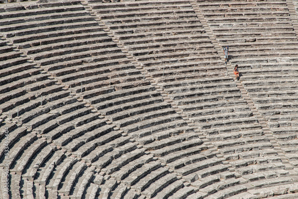 Stone seats of an ancient Greek theater in sunny day Stone seats of an ancient Greek theater in sunny day