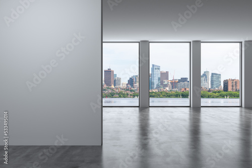 Panoramic picturesque city view of Boston at day time from modern empty room, Massachusetts. An intellectual and political center. Mockup copy space empty wall. Display concept. 3d rendering. © VideoFlow