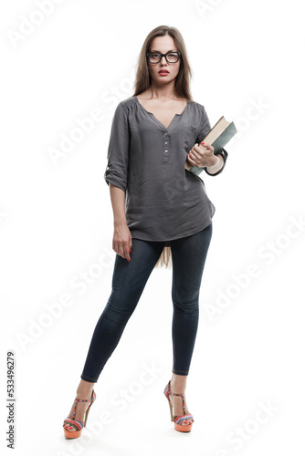 Language tutor in glasses and with dictionary on white background