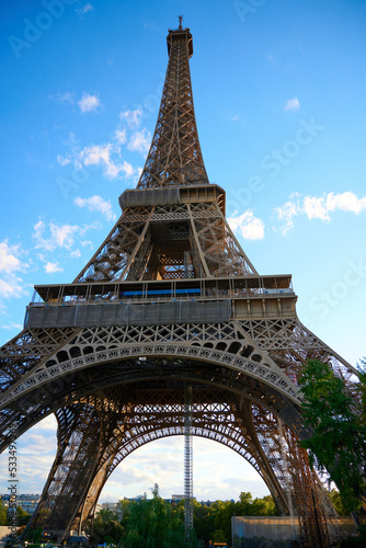 Eiffel Tower picture from underneath, making the tower looking massive and huge © Maximilian Andre