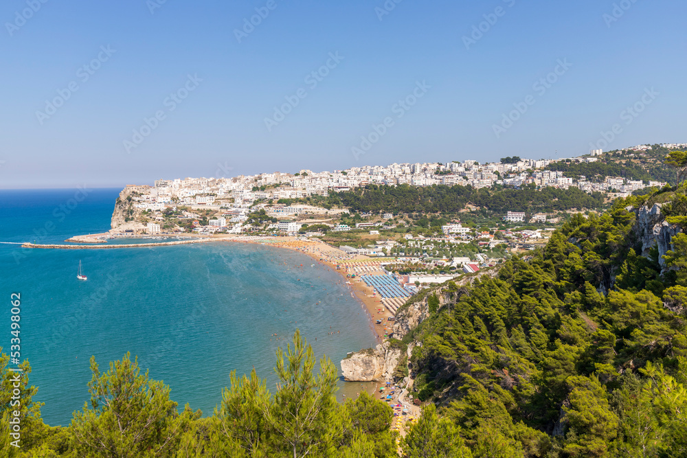 Panoramic view over the town of Peschici, sea, and the Gargano promontory, Puglia, Italy.