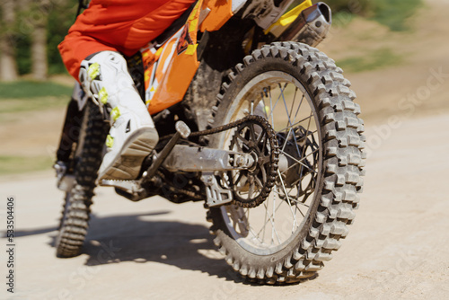 Close up motorbike. Extreme and Adrenaline. Motocross rider in action. Active lifestyle.