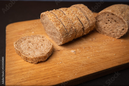 french fresh bread baguettes wooden cutting board