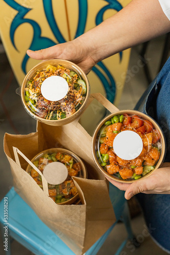 Delivery of biodegradable containers with poke, mockup