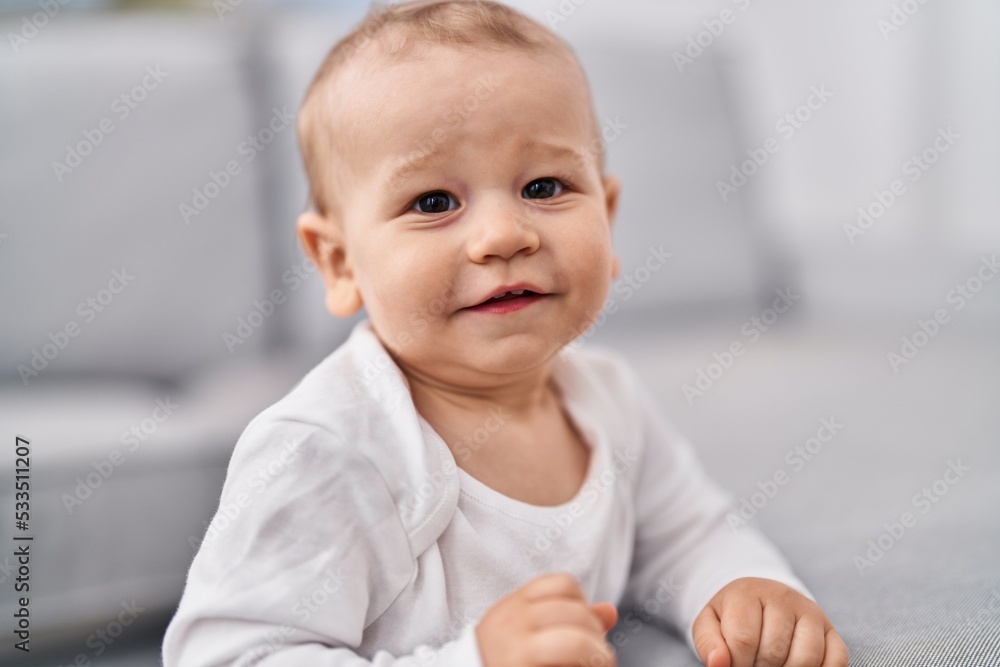 Adorable toddler smiling confident standing at home