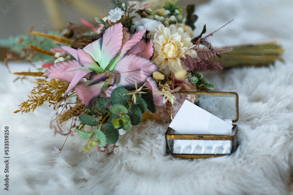 On the white pelt, Bride and groom accesories and copy spaces